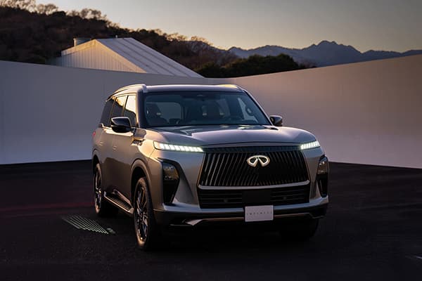 Image of a 2026 INFINITI QX80 Sport during a twilight sunset