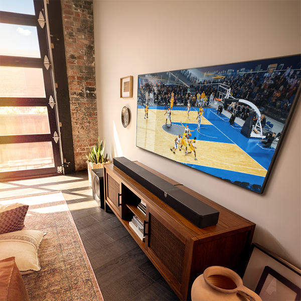 Flexus Core 300 underneath a big tv playing basketball