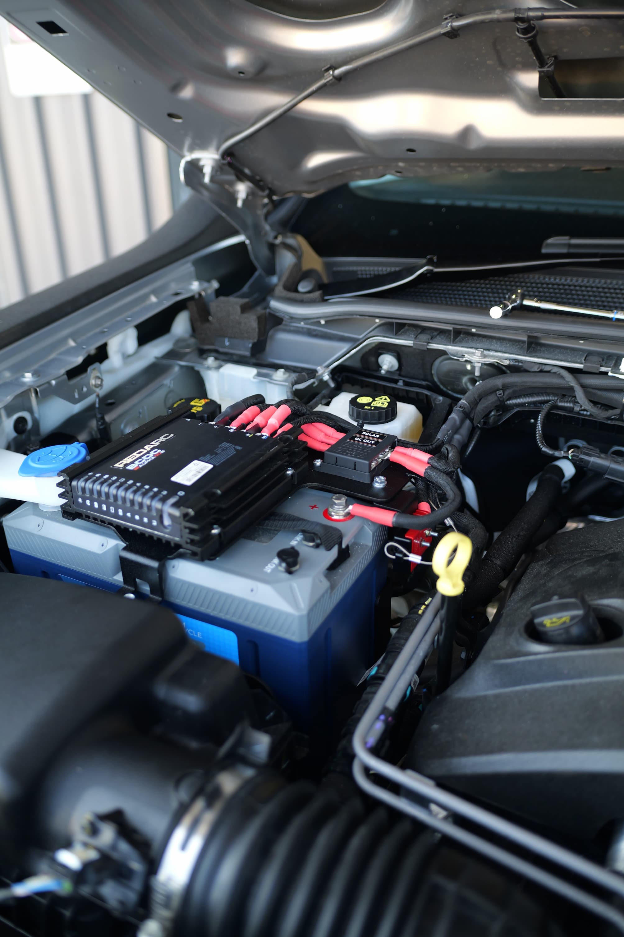 Under Bonnet Dual Battery Kit installed in Ranger engine bay, hood up