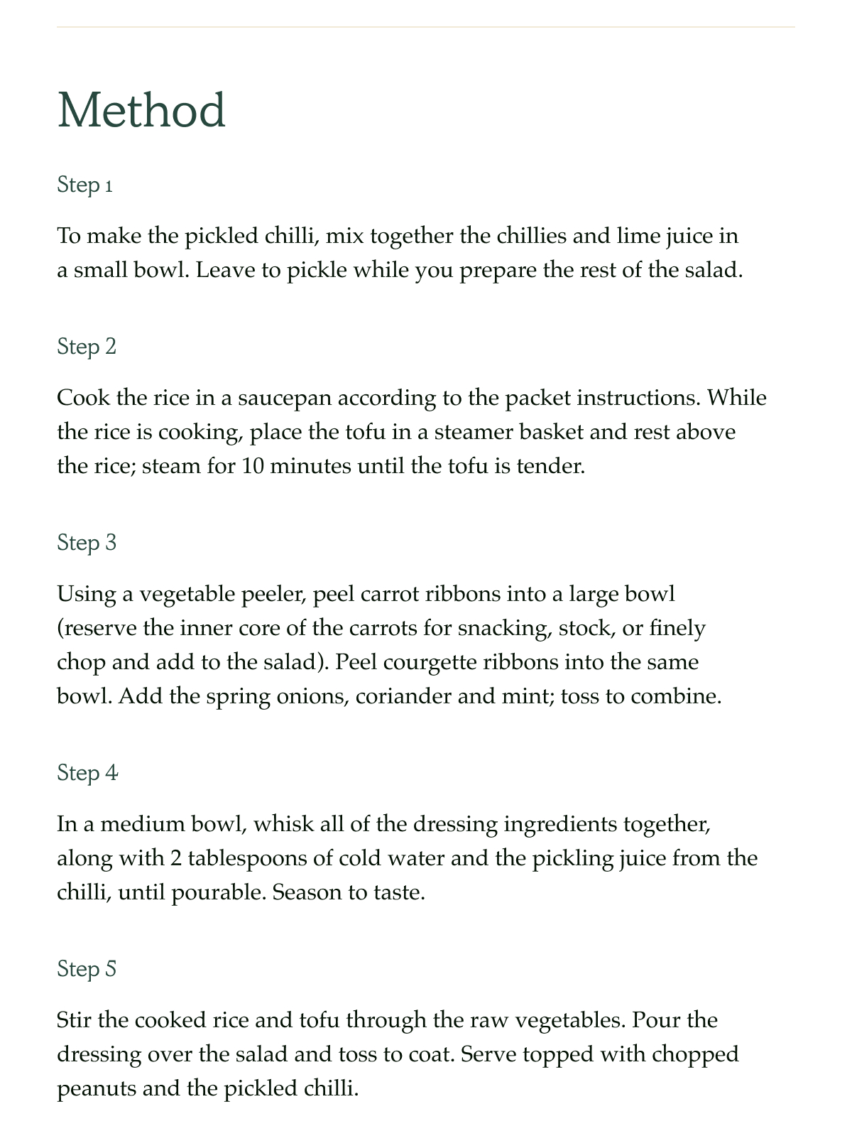 Method  Step 1 To make the pickled chilli, mix together the chillies and lime juice in a small bowl. Leave to pickle while you prepare the rest of the salad.  Step 2 Cook the rice in a saucepan according to the packet instructions. While the rice is cooking, place the tofu in a steamer basket and rest above the rice; steam for 10 minutes until the tofu is tender.  Step 3 Using a vegetable peeler, peel carrot ribbons into a large bowl (reserve the inner core of the carrots for snacking, stock, or finely chop and add to the salad). Peel courgette ribbons into the same bowl. Add the spring onions, coriander and mint; toss to combine.  Step 4 In a medium bowl, whisk all of the dressing ingredients together, along with 2 tablespoons of cold water and the pickling juice from the chilli, until pourable. Season to taste.  Step 5 Stir the cooked rice and tofu through the raw vegetables. Pour the dressing over the salad and toss to coat. Serve topped with chopped peanuts and the pickled chilli.