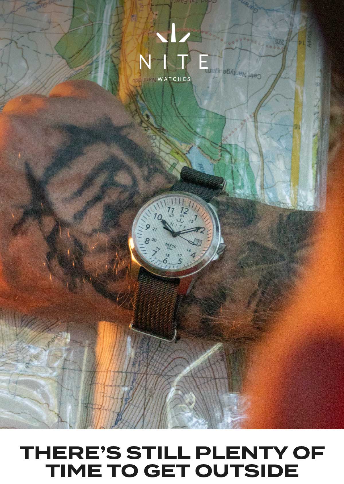 MX10 Watch on wrist above map in background