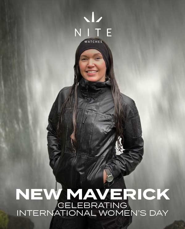 Chantelle standing by waterfall