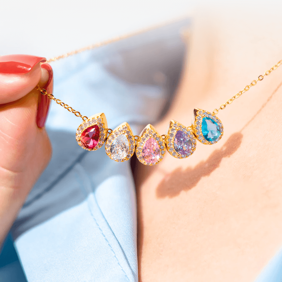 A woman showing her necklace