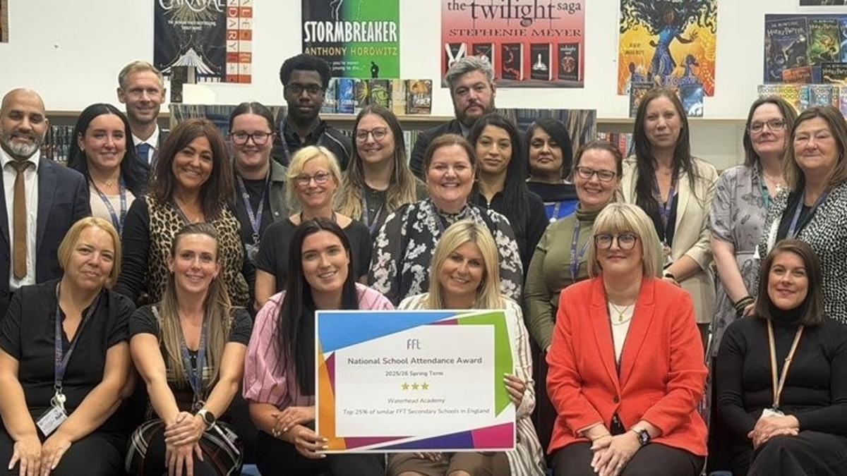 The team at Waterhead Academy with the attendance award