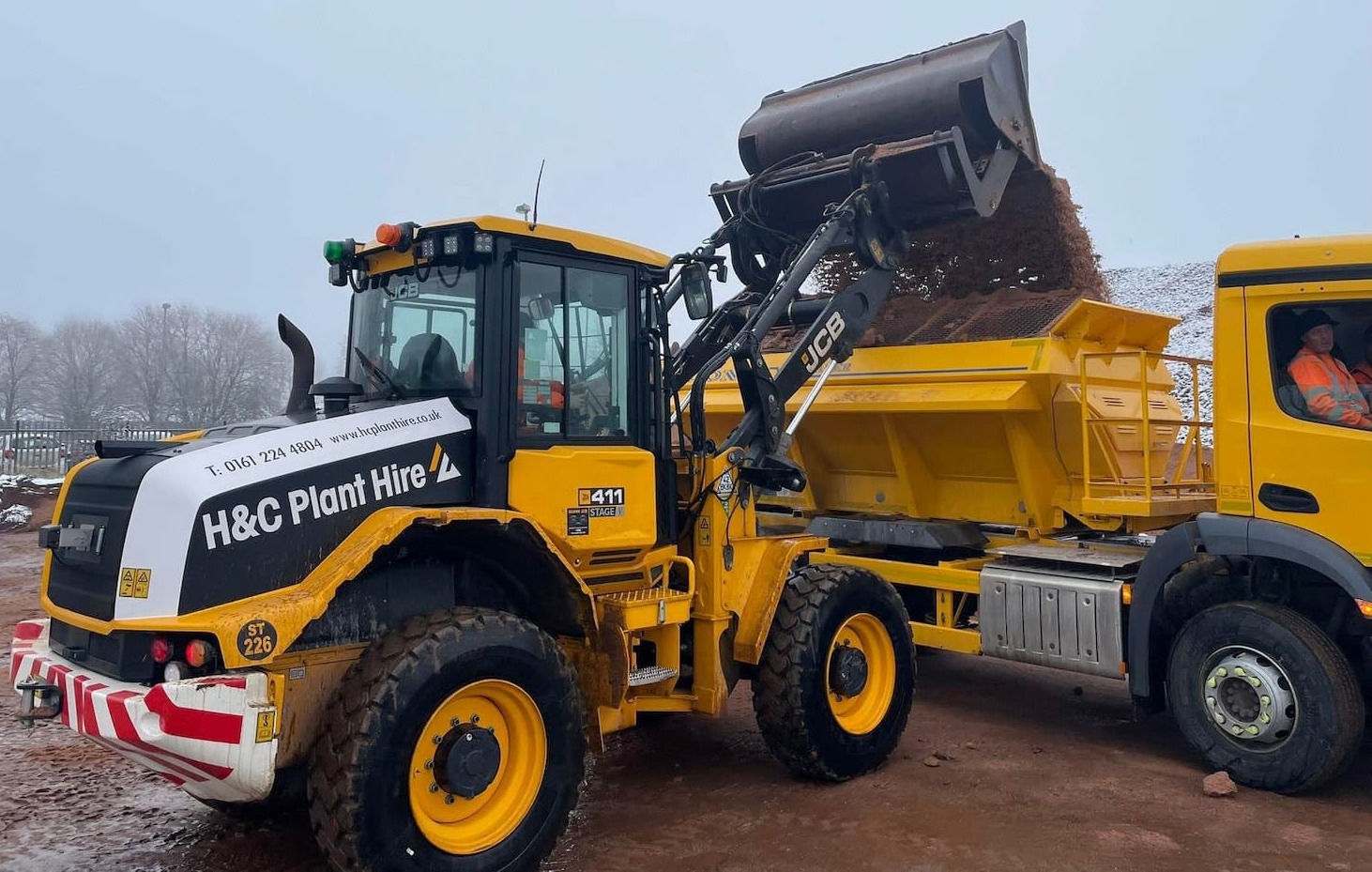 Grit being loaded by the Winter Maintenance team