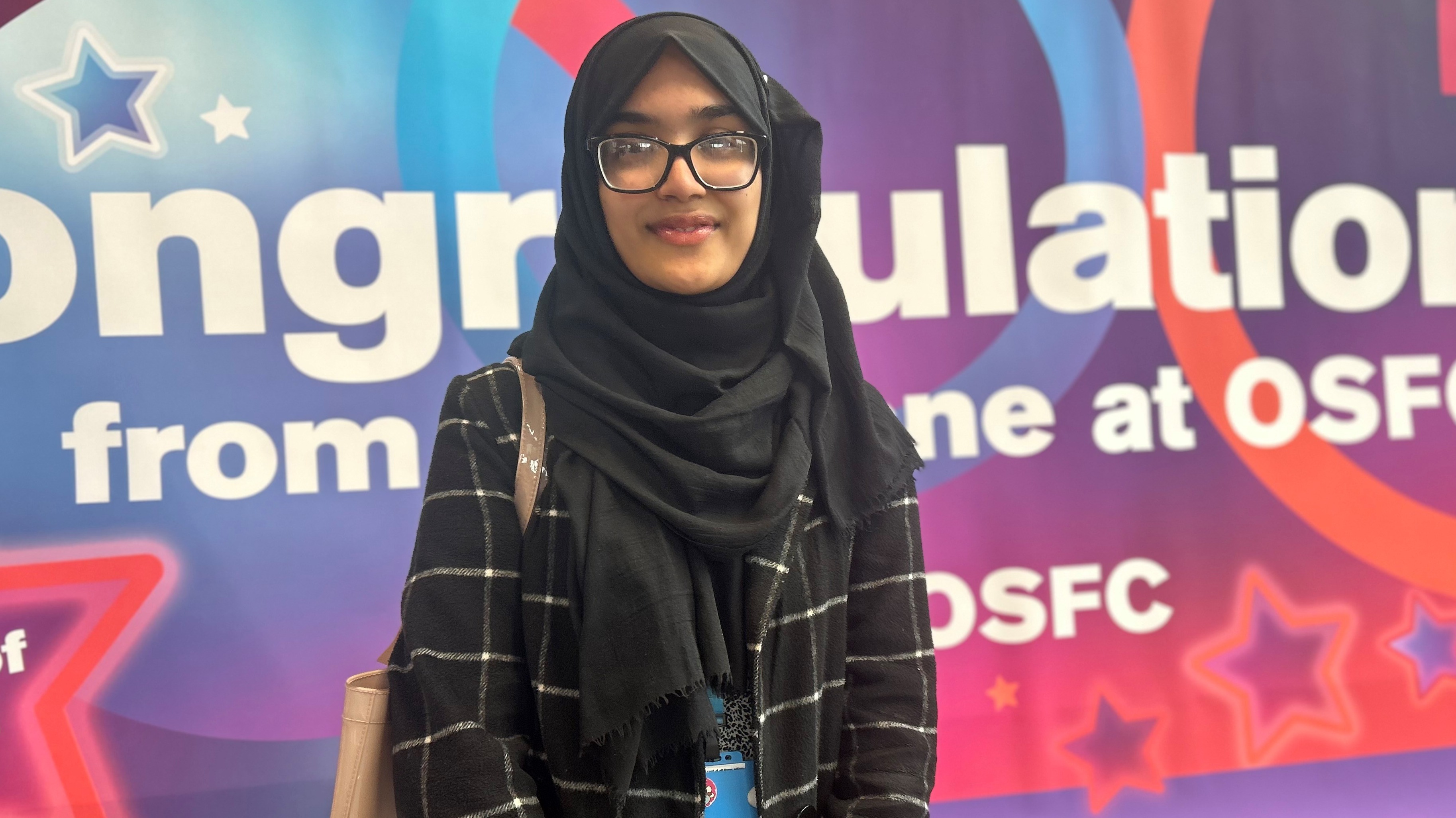 Student Laiba Javaid celebrating her exam success at Oldham Sixth Form College