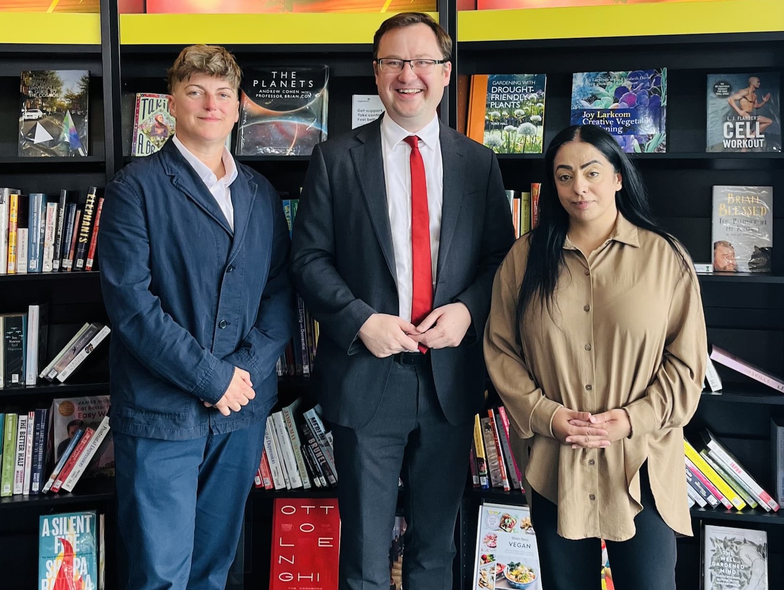 Alex Norris, Minister for Local Government, with Laura Windsor-Welsh, Chair of the Chadderton Deal Board and Oldham Director at Action Together, and Councillor Arooj Shah, Leader of Oldham Council