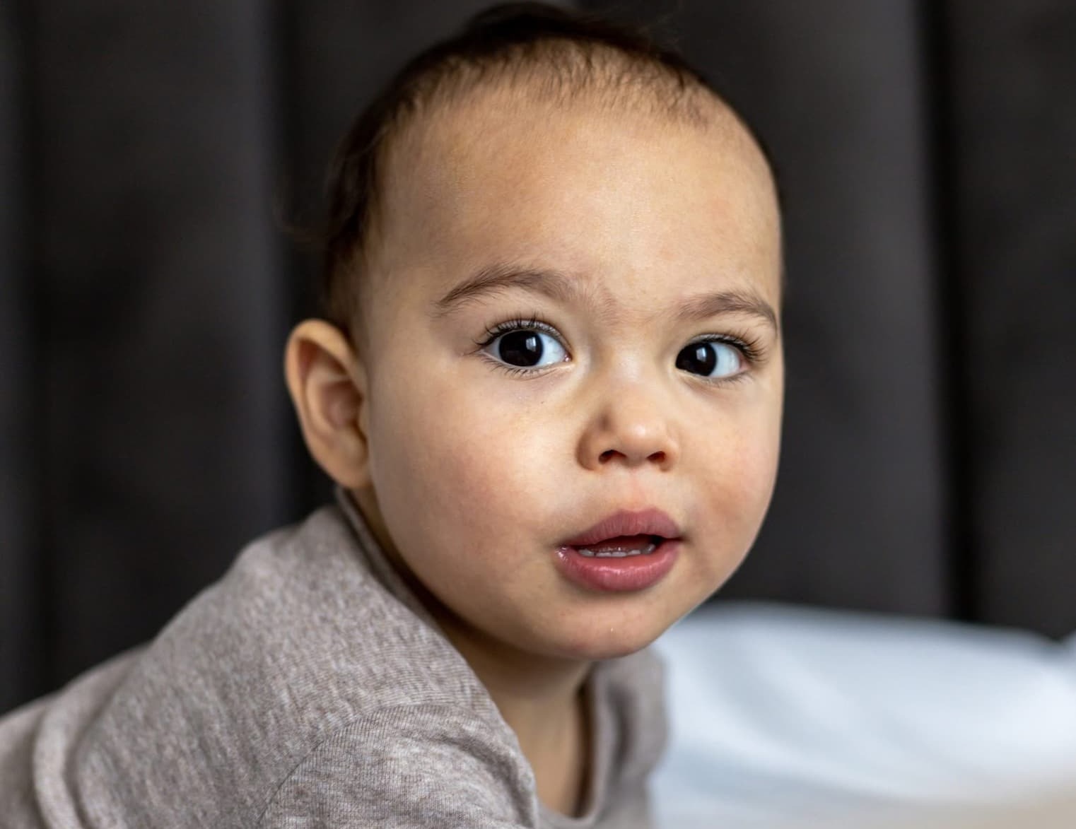 Cute baby with dark hair