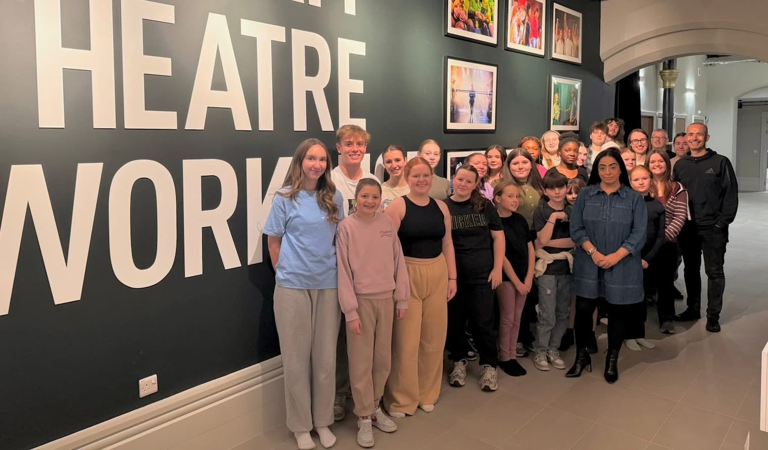 Cllr Arooj Shah and the young cast from Oldham Theatre Workshop 