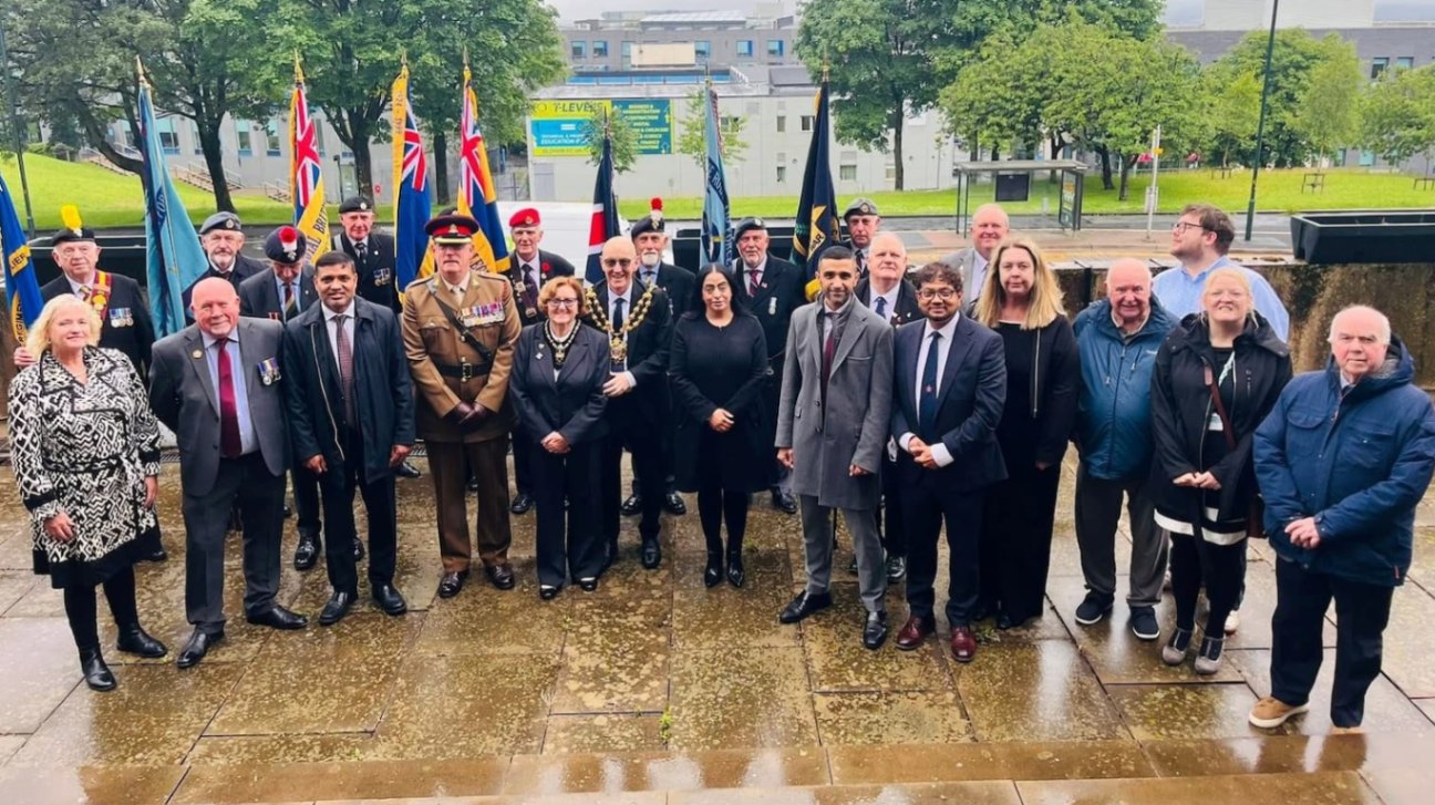 Council Leader Cllr Arooj Shah and the Mayor of Oldham, Cllr Eddie Moores with fellow councillors and representatives from the Royal British Legion branches in Oldham, Royton, and Saddleworth