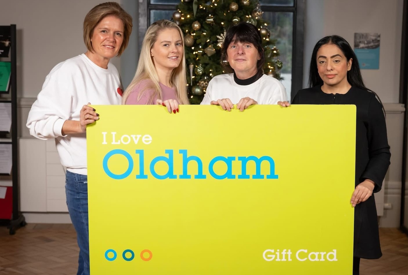 /Oldham Council Leader Cllr Arooj Shah with the Our Community Wardrobe Oldham team