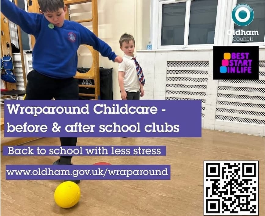 A boy in a school uniform kicking a football as another child watches on 