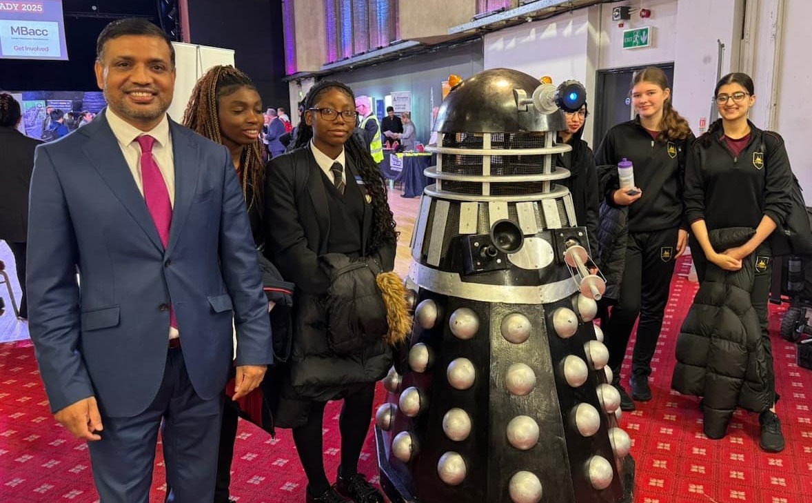Cllr Mohon Ali with pupils - and a dalek - at the Future Ready Careers Experience