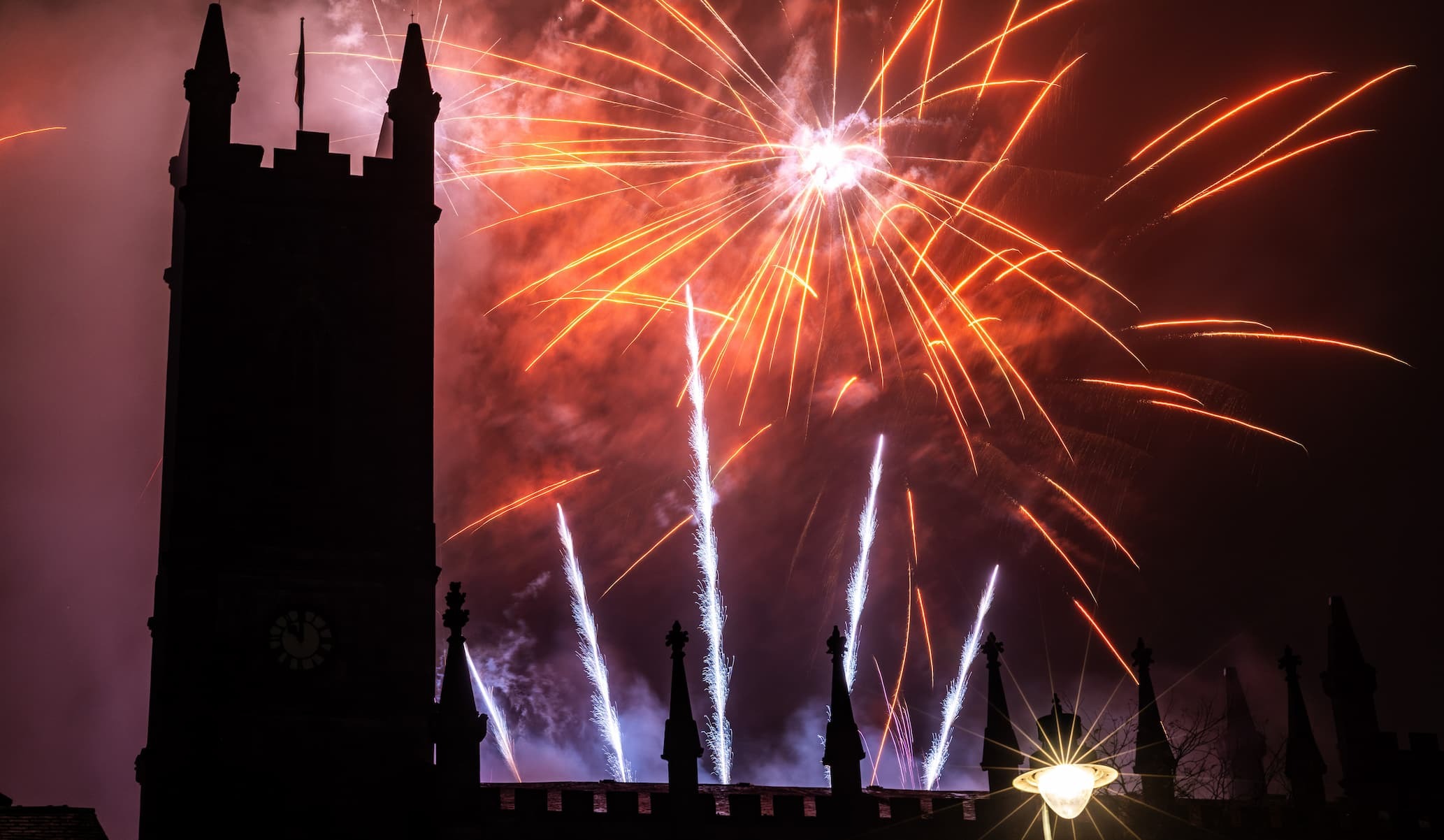 Exploding fireworks over the town hall
