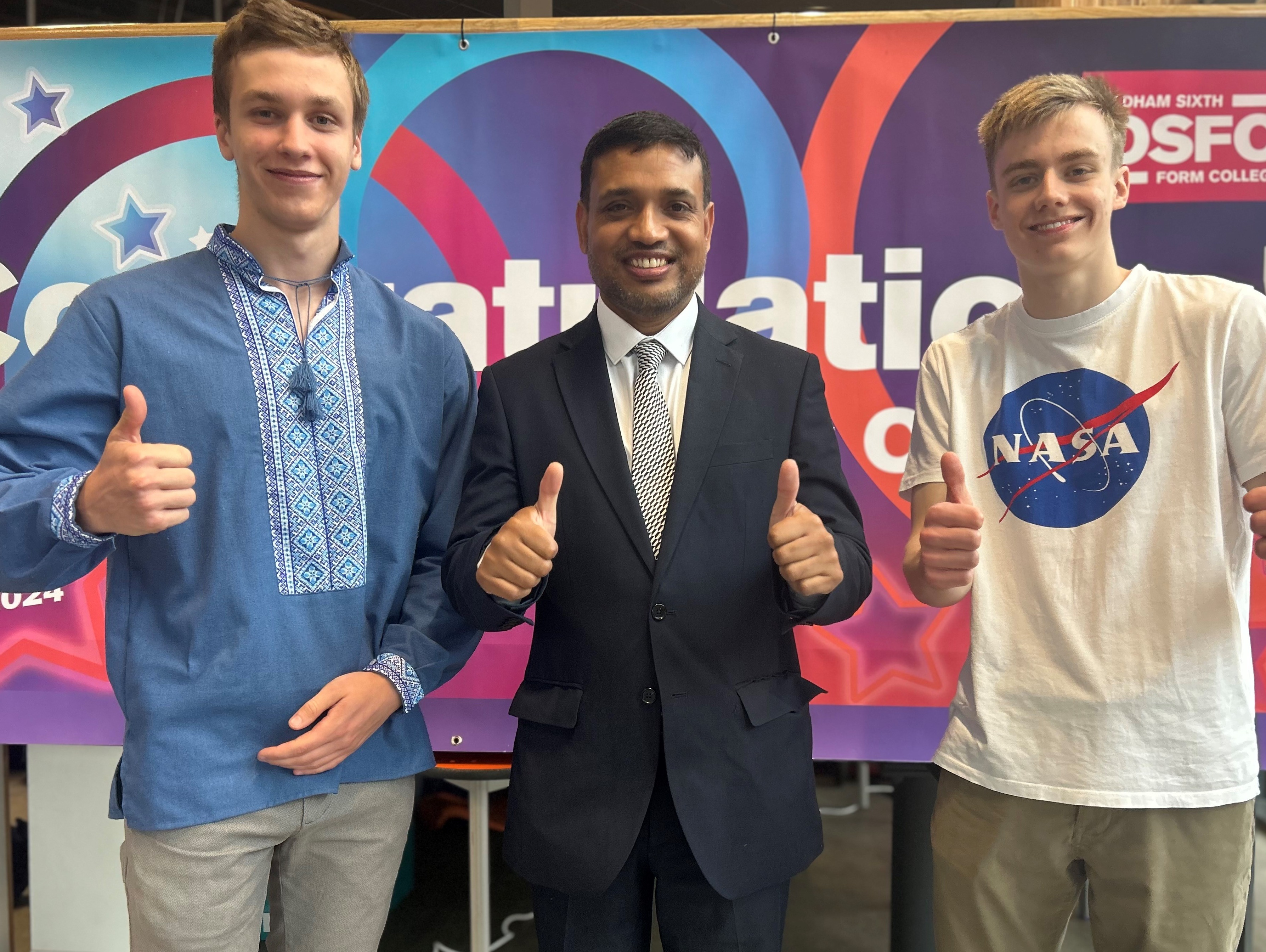 Mykailo Tolstikhin (left) and best friend Joshua Tindall with Clllr Mohon Ali