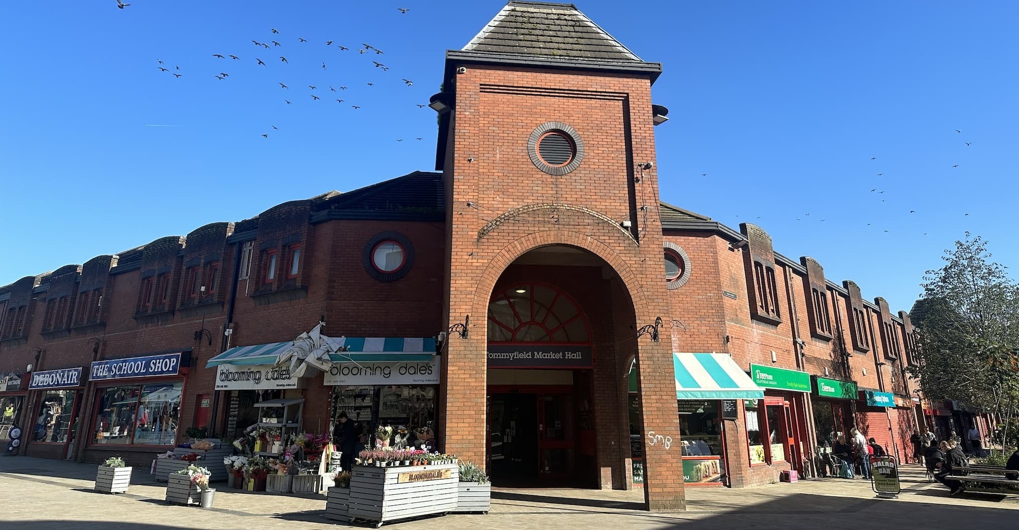 Outdoor view of Tommyfield Market bathed in sunlight