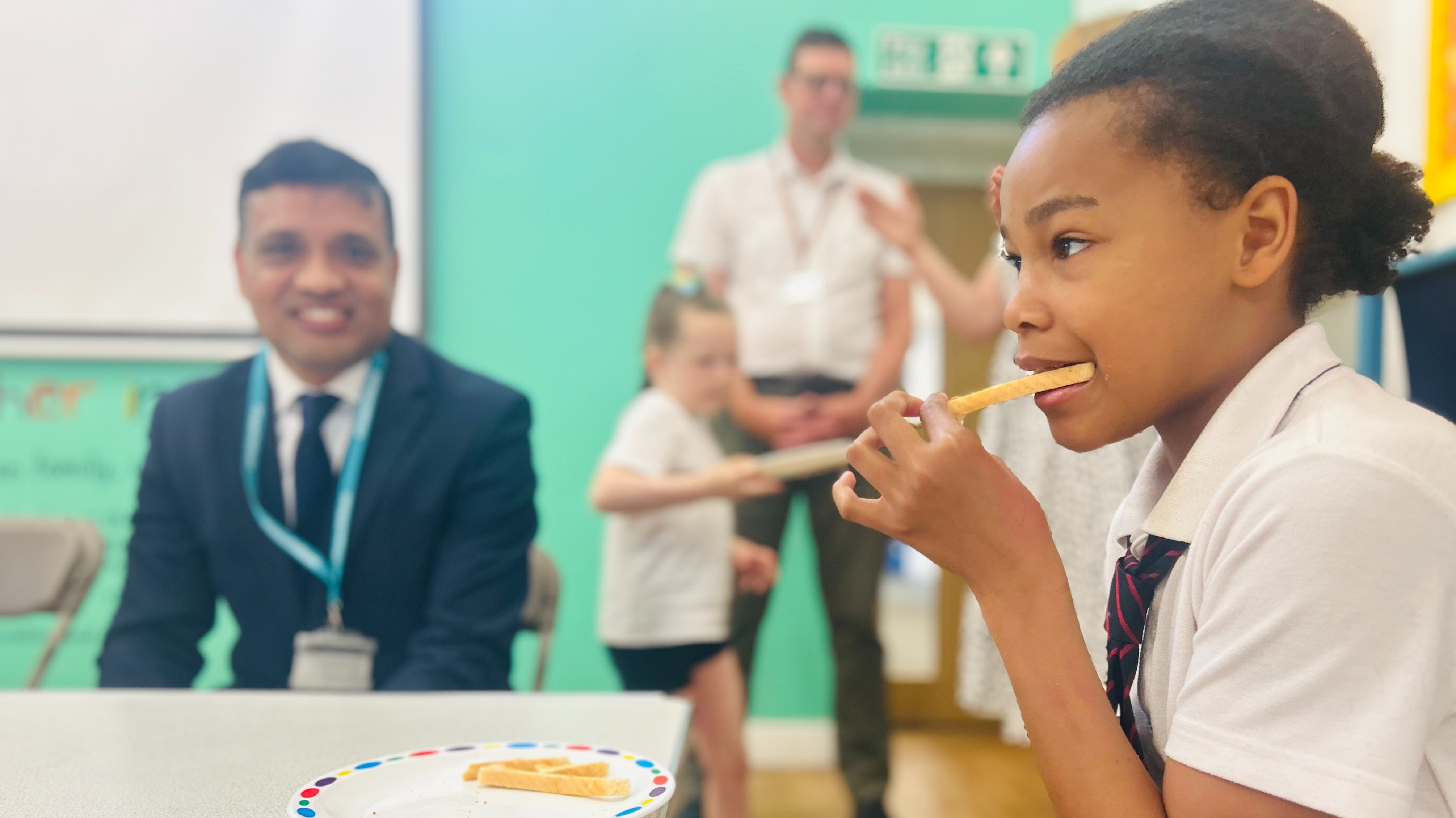 Cllr Mohon Ali, Cabinet Member for Education and Skills at Oldham Council, visiting the breakfast club 