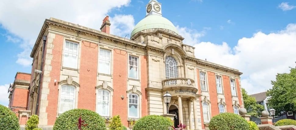 Outside view of Chadderton Town Hall in the sunshine