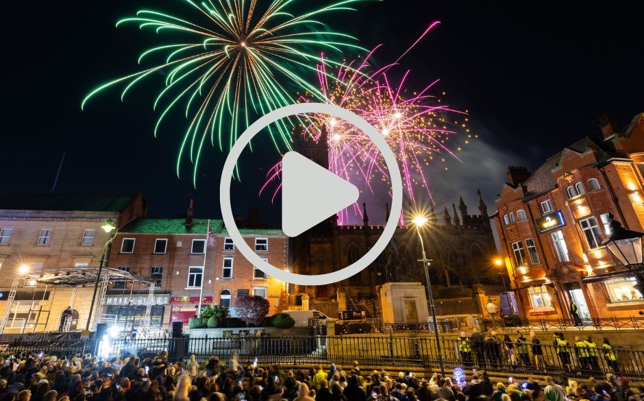 The people of Oldham watching the fireworks over Oldham town centre