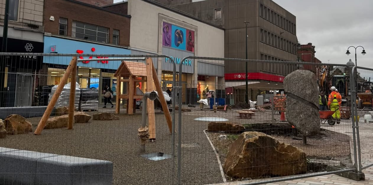 Landscape image of new platy area in front of Primark and Tui