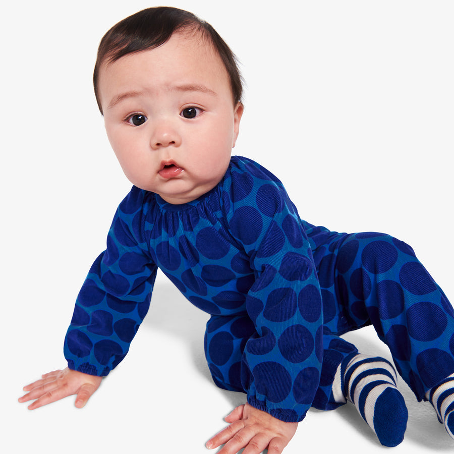 Baby corduroy romper in cutout dot