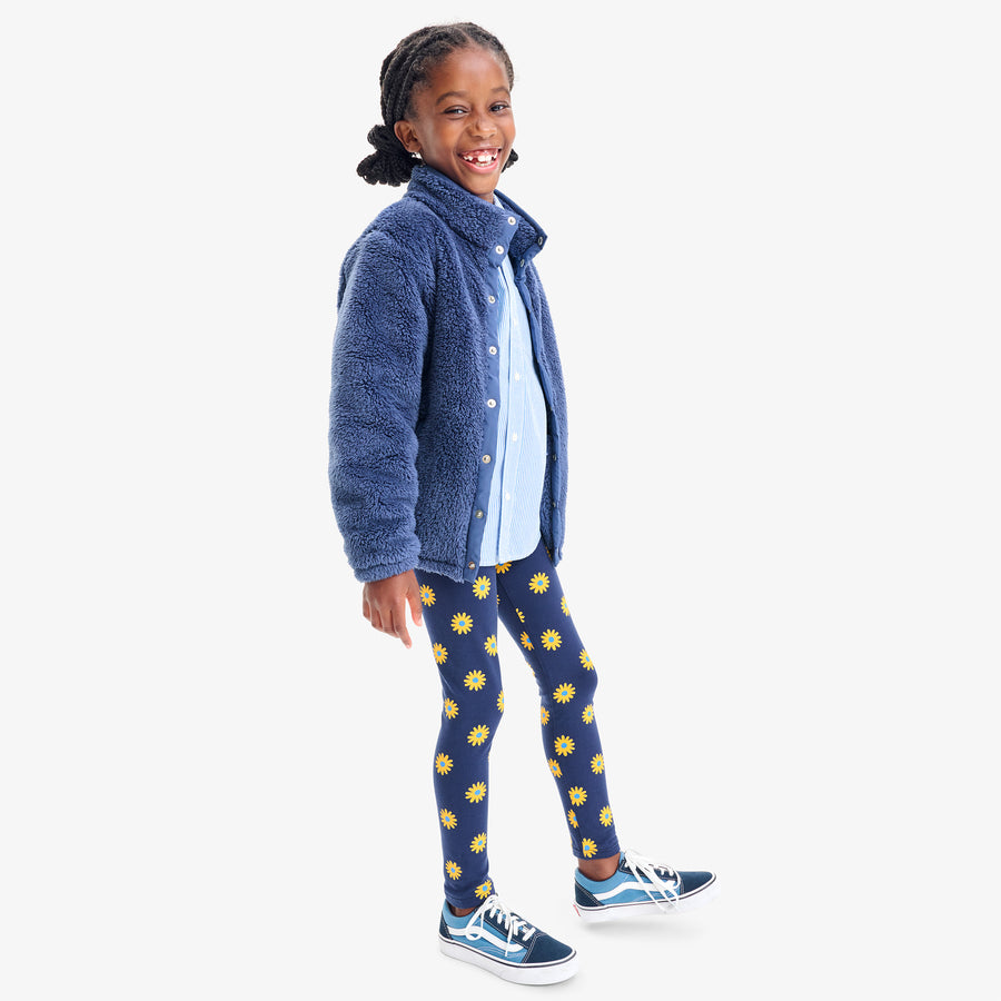 Kids legging in sunflowers
