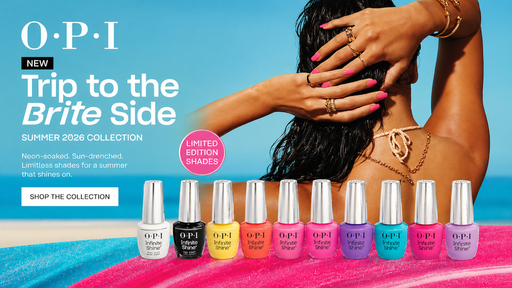 Image of a tanned woman at the beach, showing her shoulders, arms,, hands, and hair from behind. In the background, you can see blue sky, blue water and sand. In the foreground, there are 10 OPI bottles, displaying some of the OPI Trip to the Brite Side Summer 2026 Collection Infinite Shine polishes.