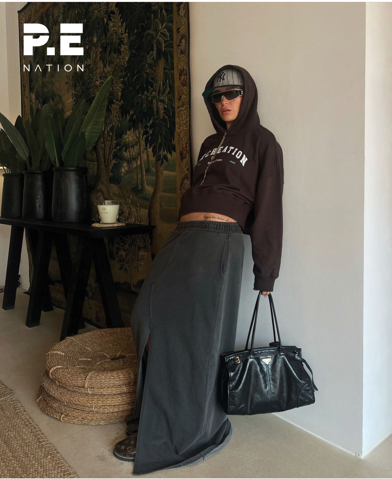 Brunette woman wearing PE Nation