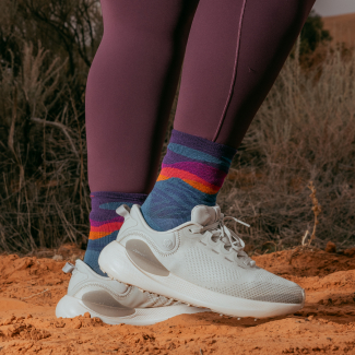 Shop Mirnavated socks - a runner wearing blue purple and pink run socks