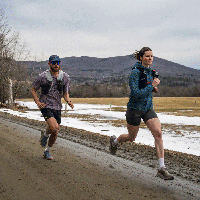 Shop Run Socks - runners jog through muddy, icy, dusty, and rocky terrain