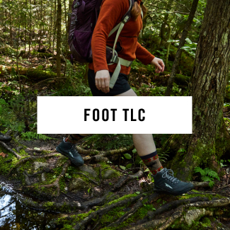 Read Foot TLC - a hiker walks along a wet forest trail