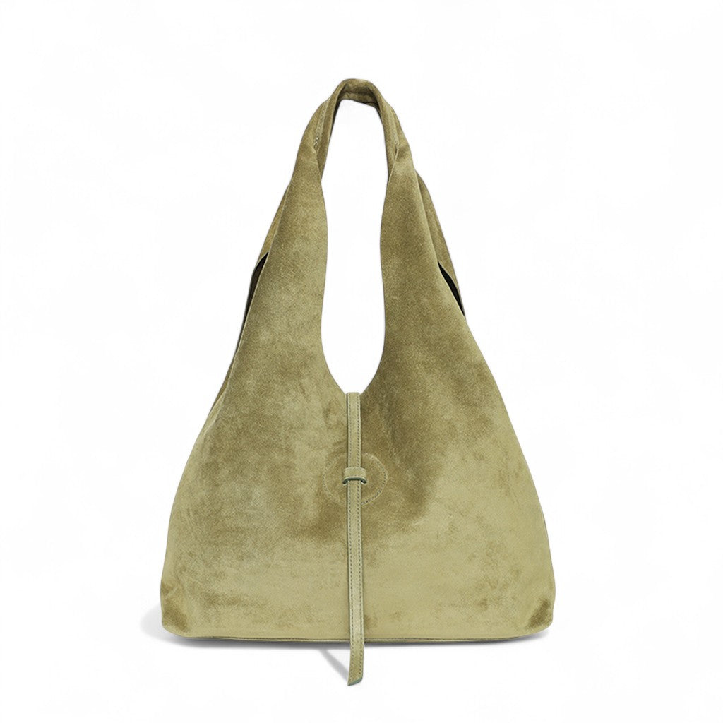 Soft olive suede hobo-style handbag with a slouchy silhouette and wide shoulder strap, featuring a minimalist drawstring closure detail at the center and a subtle, unstructured shape.