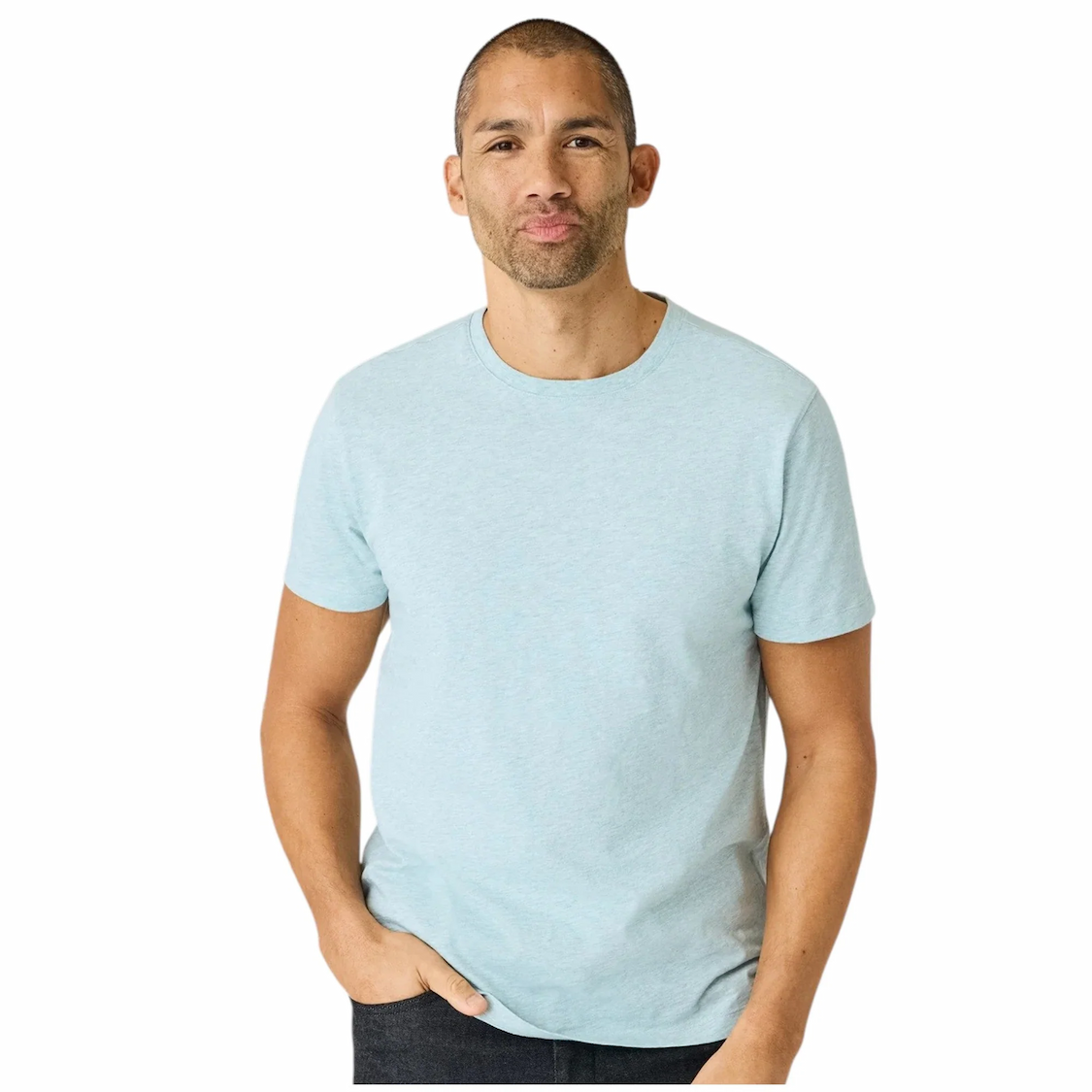 Man wearing a light blue crewneck T-shirt with dark pants. Fearrington Village.