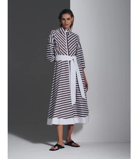 Brown and white striped midi shirt dress with three-quarter sleeves, a stand collar, and a wide white tie belt, paired with black sandals. Fearrington Village.
