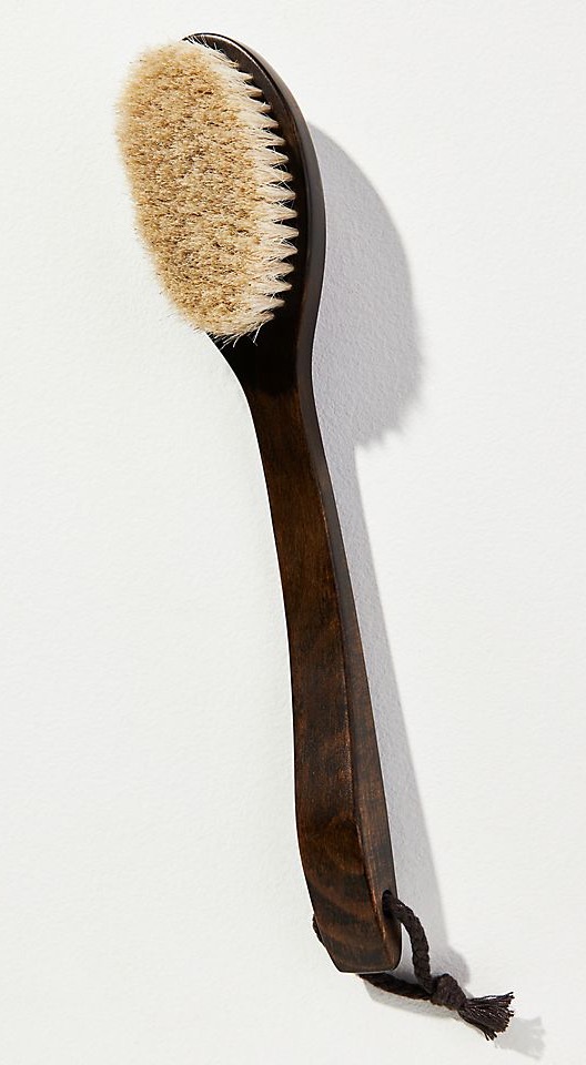 Long-handled natural bristle body brush for exfoliation and dry brushing. Fearrington Village.