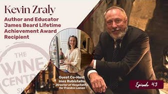 A promotional graphic features Kevin Zraly, an author and educator and James Beard Lifetime Achievement Award recipient, alongside a smaller inset of guest co-host Inez Rubrisublo, Director of Hospitality, with “The Wine Center” branding and episode details displayed.