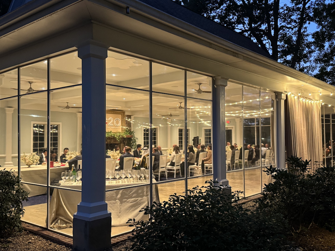 Guests gathered for an elegant evening dinner in the Garden Terrace at Fearrington Village.