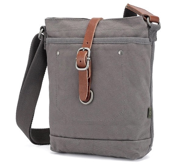 Gray canvas crossbody bag with a leather buckle closure. Fearrington Village.