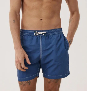 Men’s classic blue swim trunks with contrast stitching, side pockets, and a white drawstring waistband, shown against a neutral background.