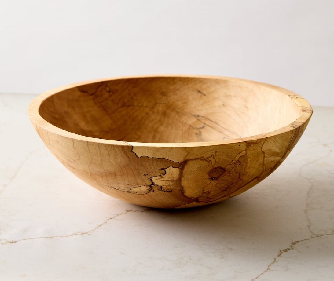 Handcrafted wooden bowl showcasing distinctive natural grain. Fearrington Village.