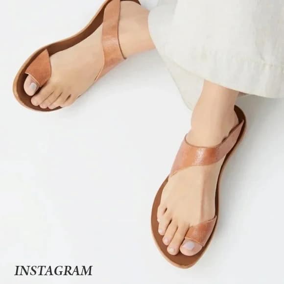 Leather thong sandals with a minimalist design. Fearrington Village.
