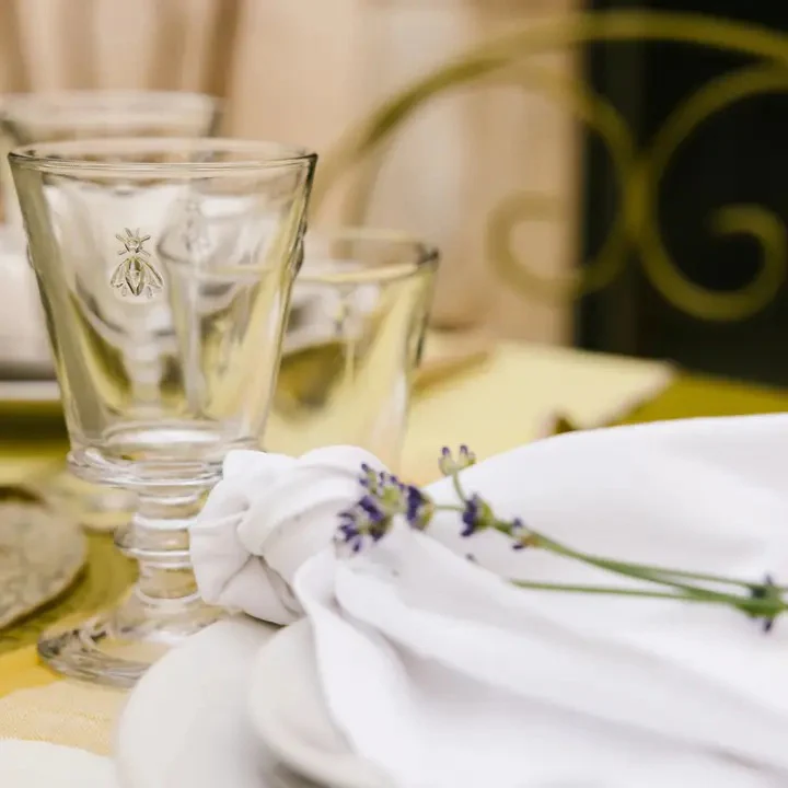 Bee-etched glass with elegant table setting, Fearrington Village.
