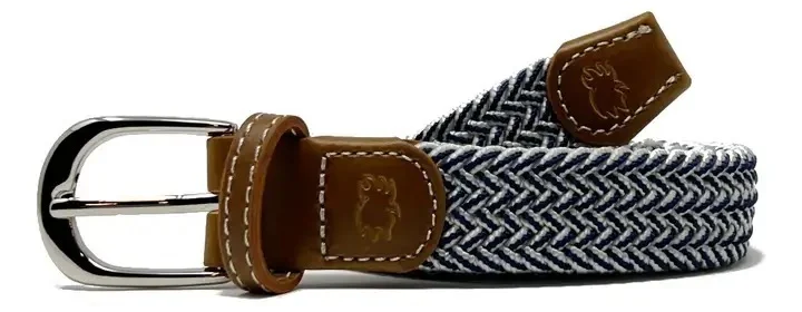 Woven stretch belt with navy and white herringbone pattern and brown leather trim. Fearrington Village.