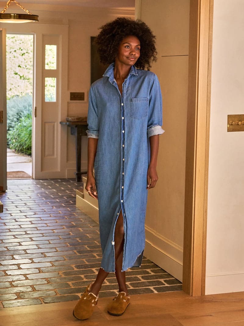 model wearing a long denim shirtdress by frank & eileen