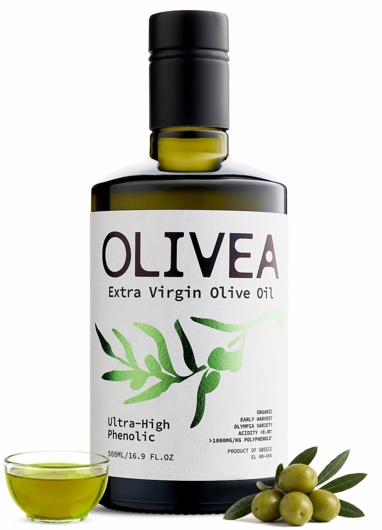 Bottle of Olivea extra virgin olive oil with fresh olives and a tasting dish. Fearrington Village.