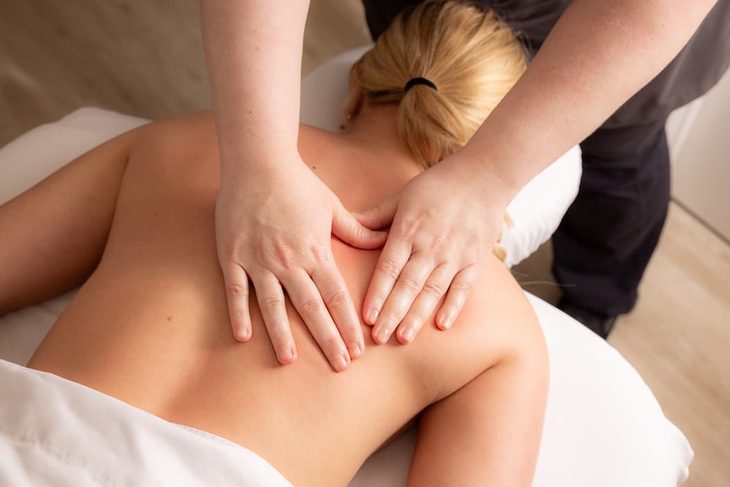 Relaxing massage treatment focused on the upper back and shoulders at The Spa at Fearrington. Fearrington Village.