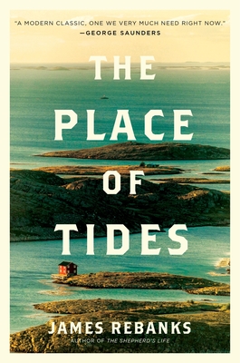 The cover of The Place of Tides by James Rebanks features a serene coastal landscape of small rocky islands surrounded by turquoise-blue water. A solitary red-roofed house sits on one of the islands, emphasizing the remote setting. The title appears in large white block letters across the center, with a quote from George Saunders at the top and the author's name at the bottom. The overall design evokes solitude, nature, and life shaped by the rhythms of the sea.