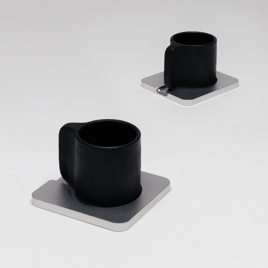 Espresso cup on its aluminum saucer