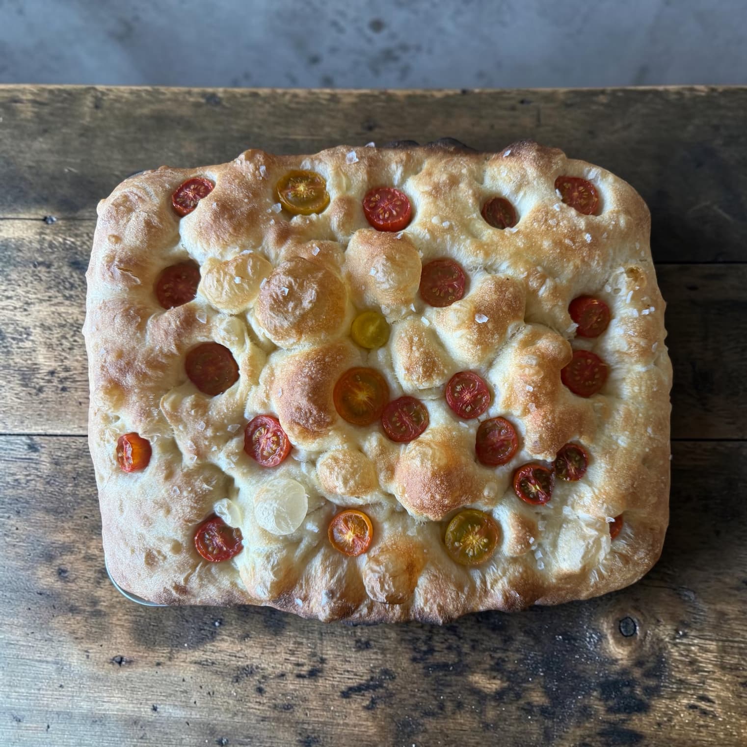 72 hour pizza dough on a wooden pizza peel