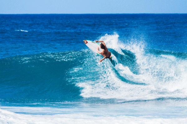 GIF of surfer riding a wave